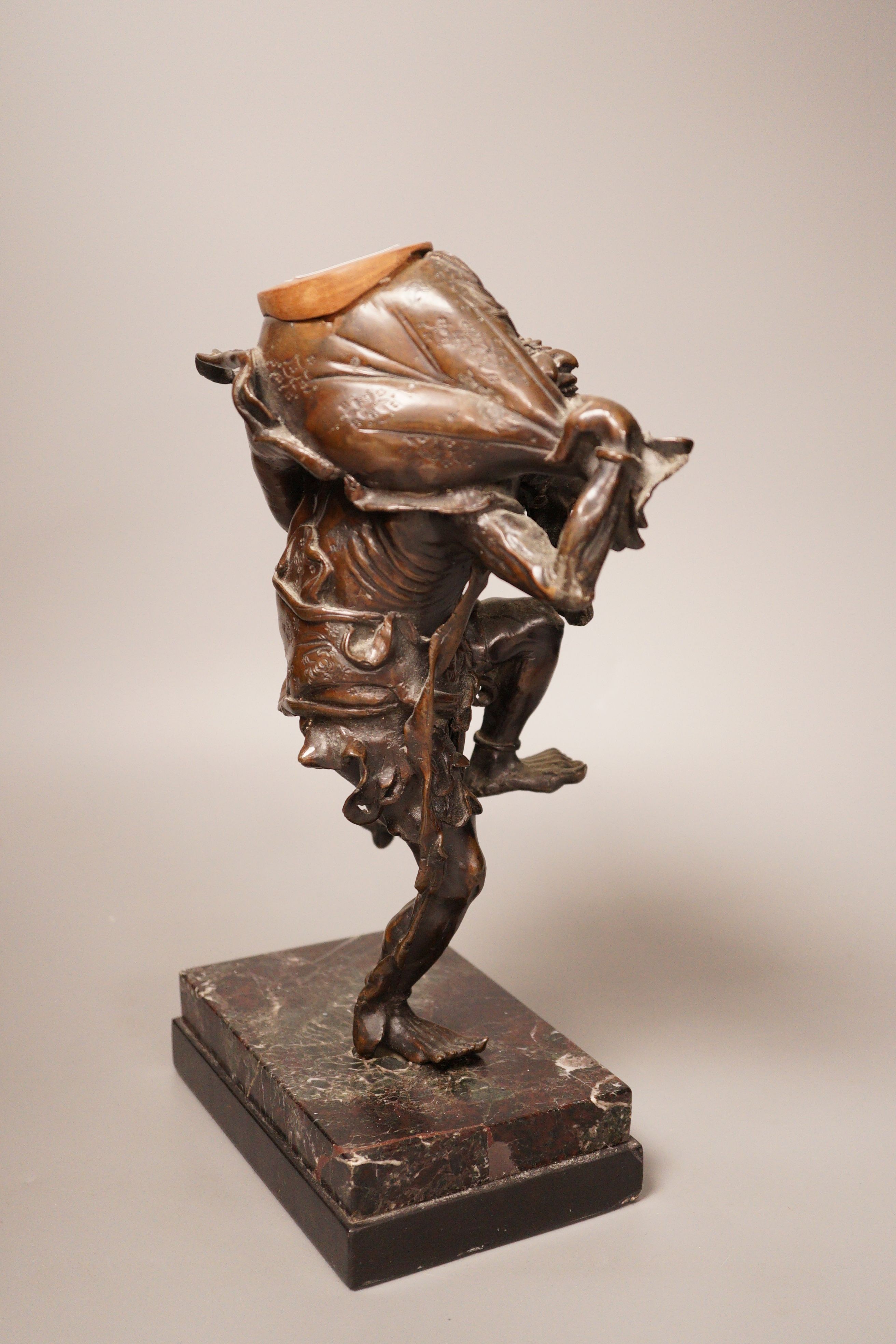 A Meiji period Japanese bronze figural censer, study of a demon, 31cm
